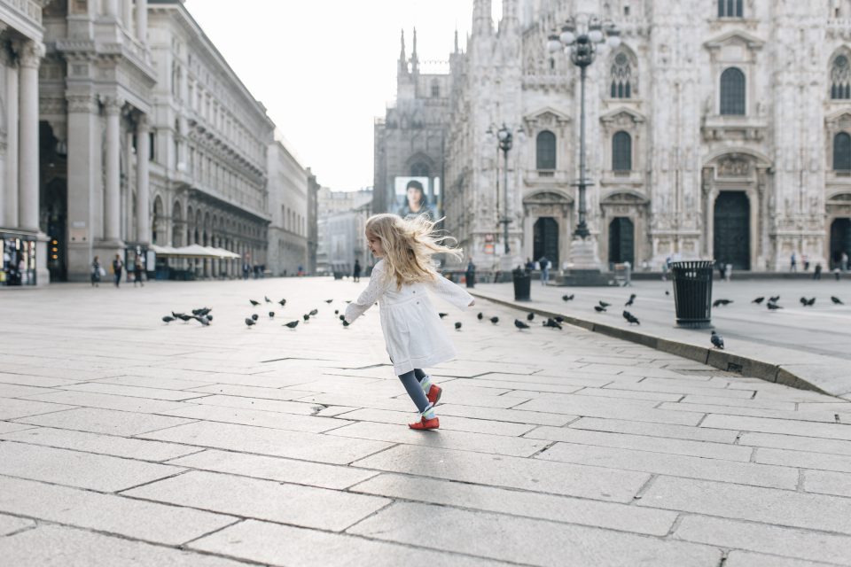 Little girl running in Milan
