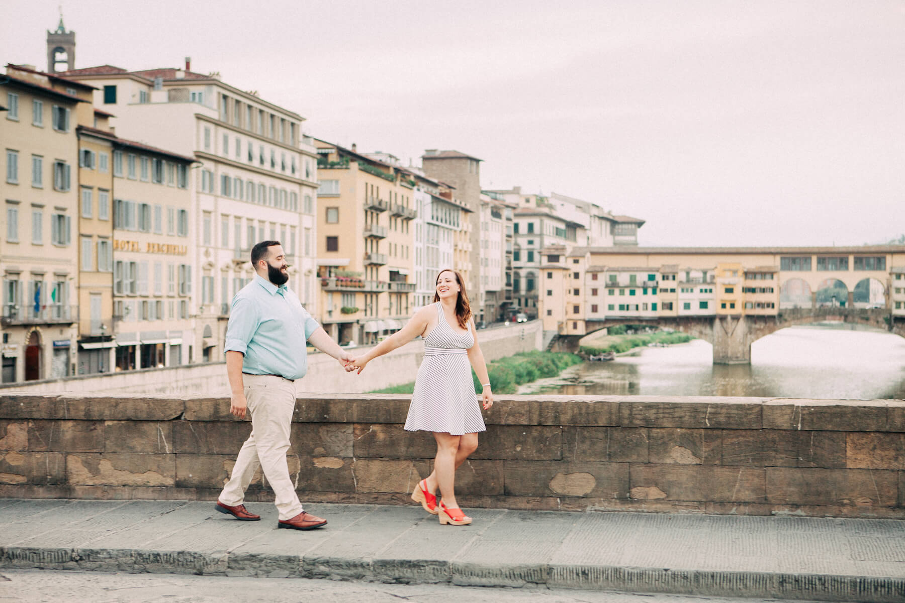 Couple walking in Florence, Italy