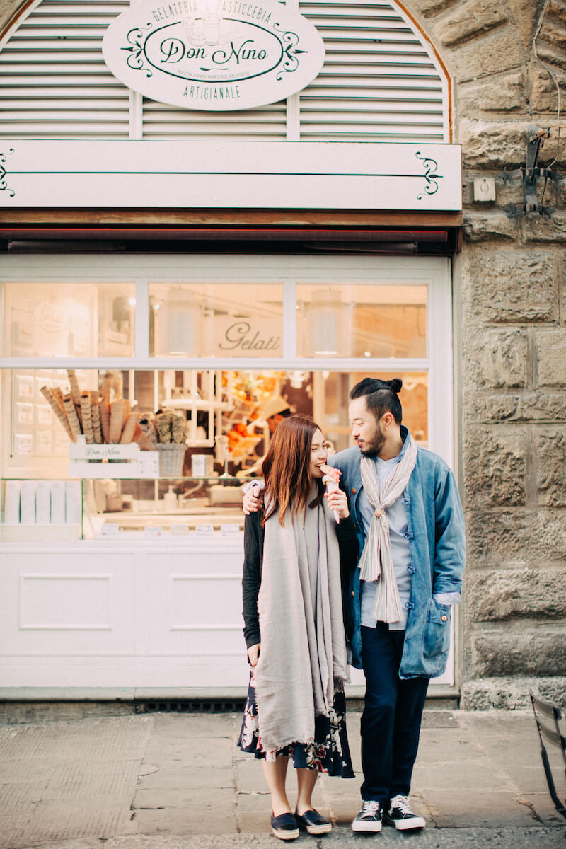 Couple standing together in front of Don Nuno gelato shop on couples trip in Florence, Italy