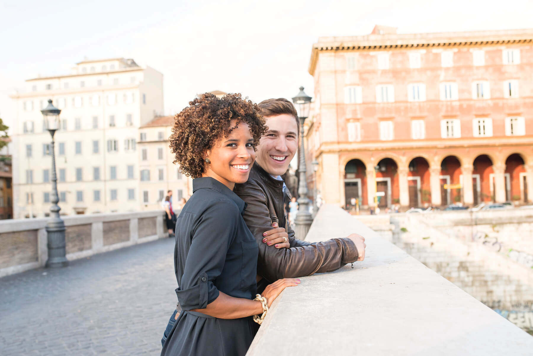 Couple standing together and looking at the camera in Rome, Italy