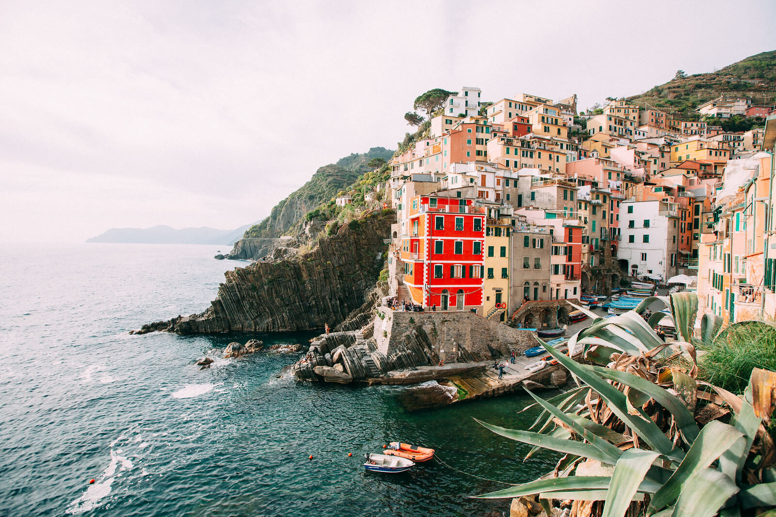 Cinque Terre coastline with colourful houses perched along the cliffs in Italy