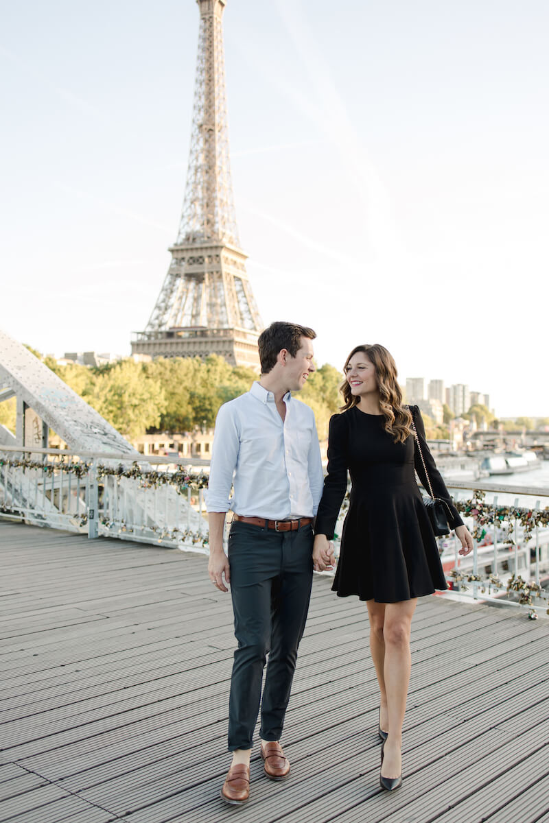 couple trip, girl wearing a black form fitting dress in Paris, France