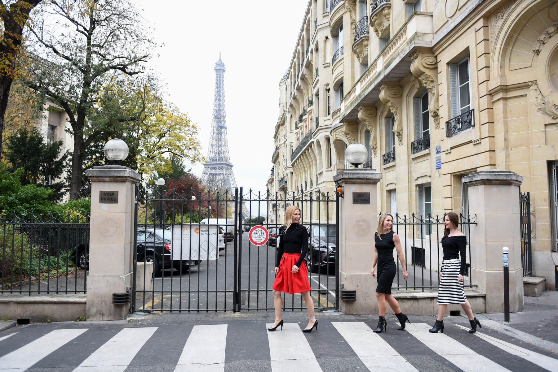 Friends trip wearing skirts and walking in Paris, France