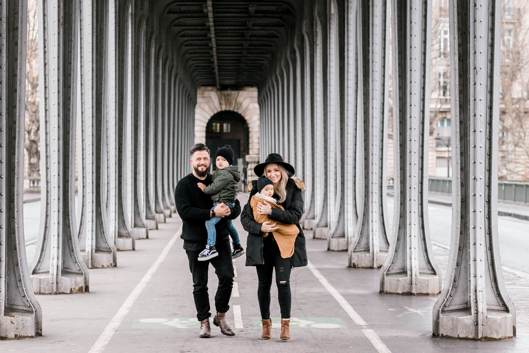 Family with kids wearing casual clothes in autumn on a family trip in Paris, France