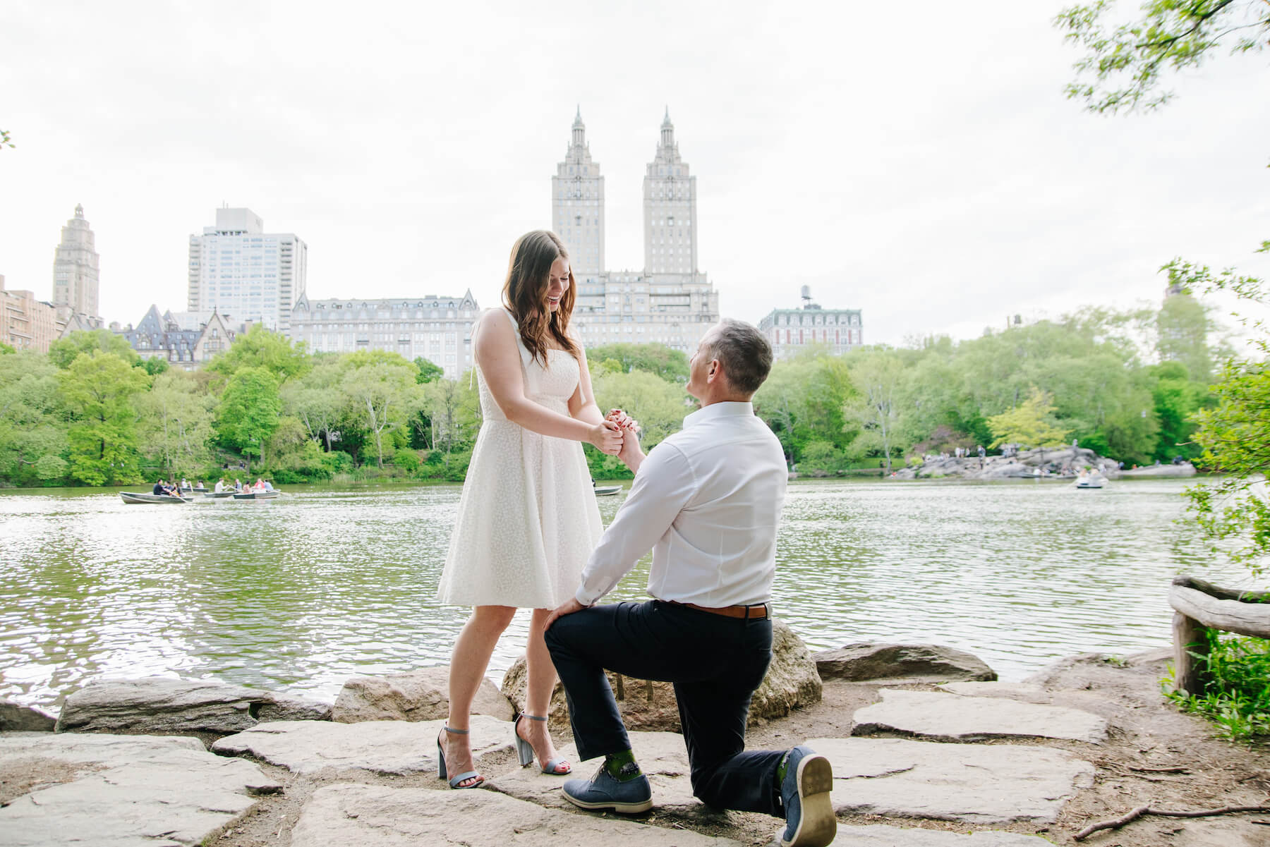 Man proposing to his partner in Central Park, New York City USA