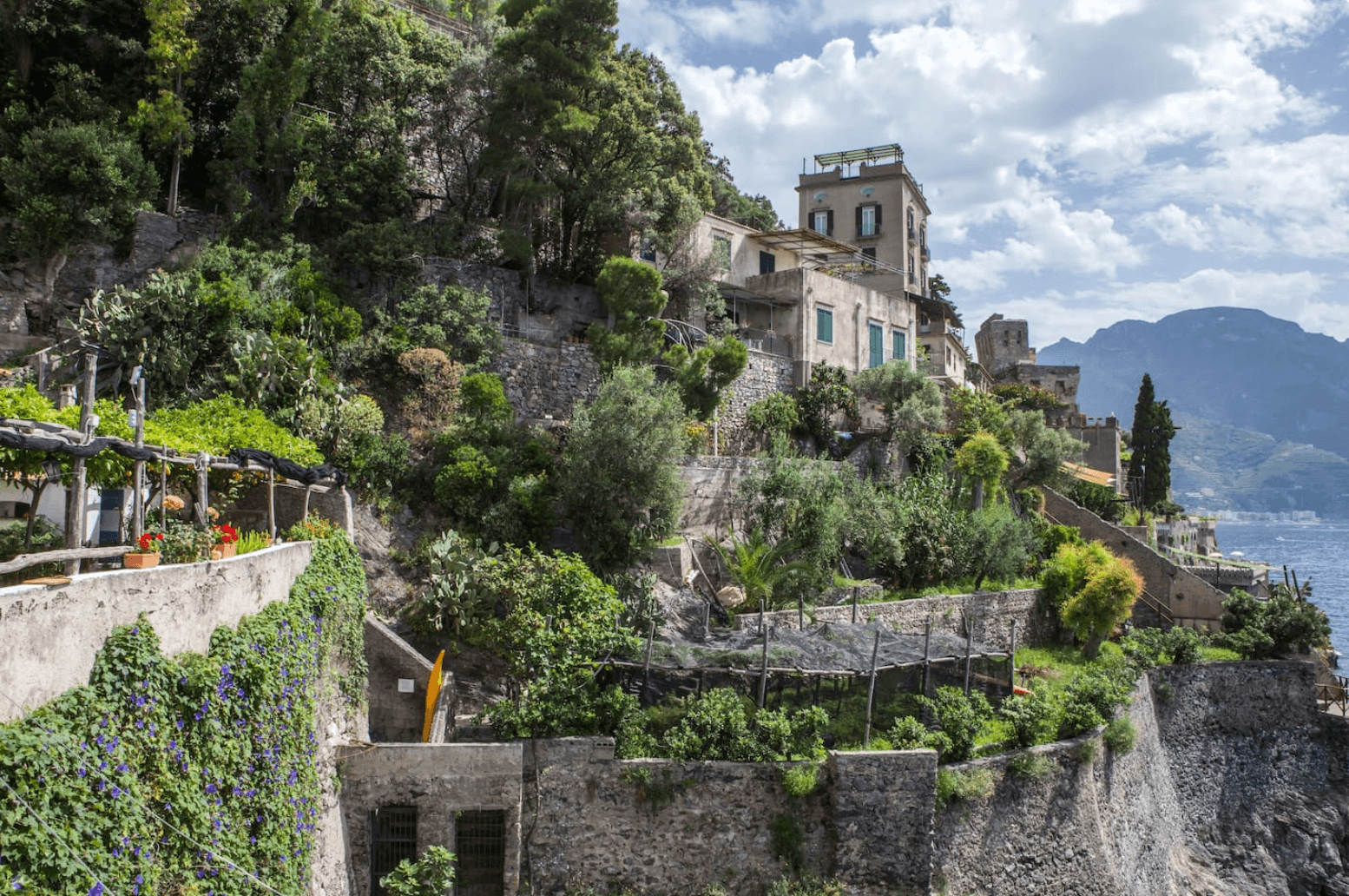 an image an airbnb view of the cliff side in Amalfi Coast, Italy