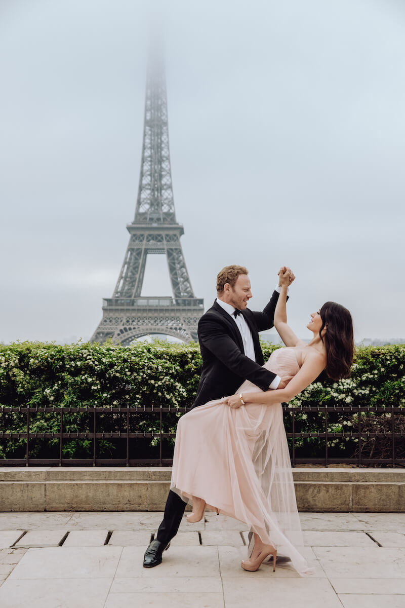 Couple in paris holding arms in Paris France