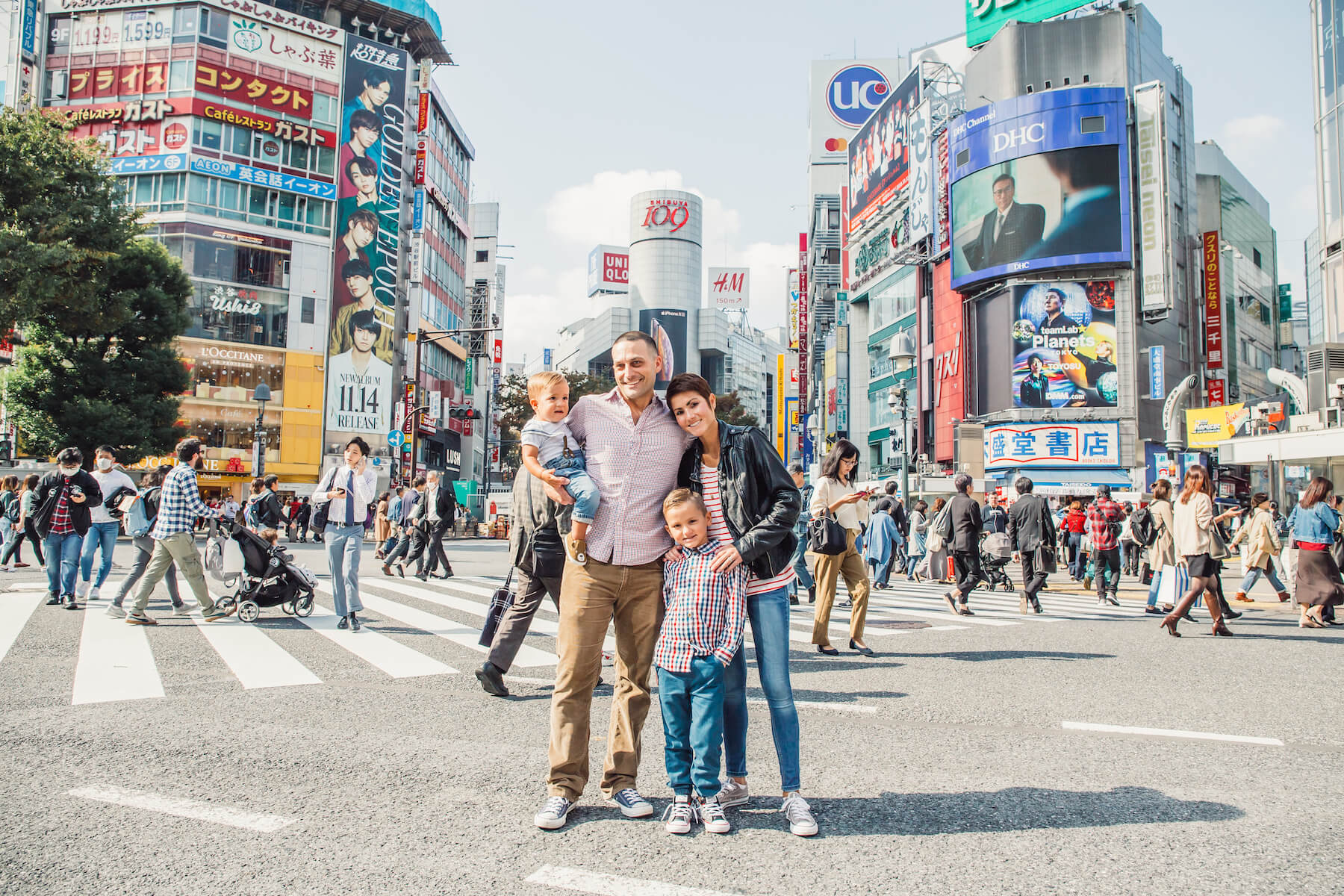 family of four standing for a photo in Tokyo, Japan