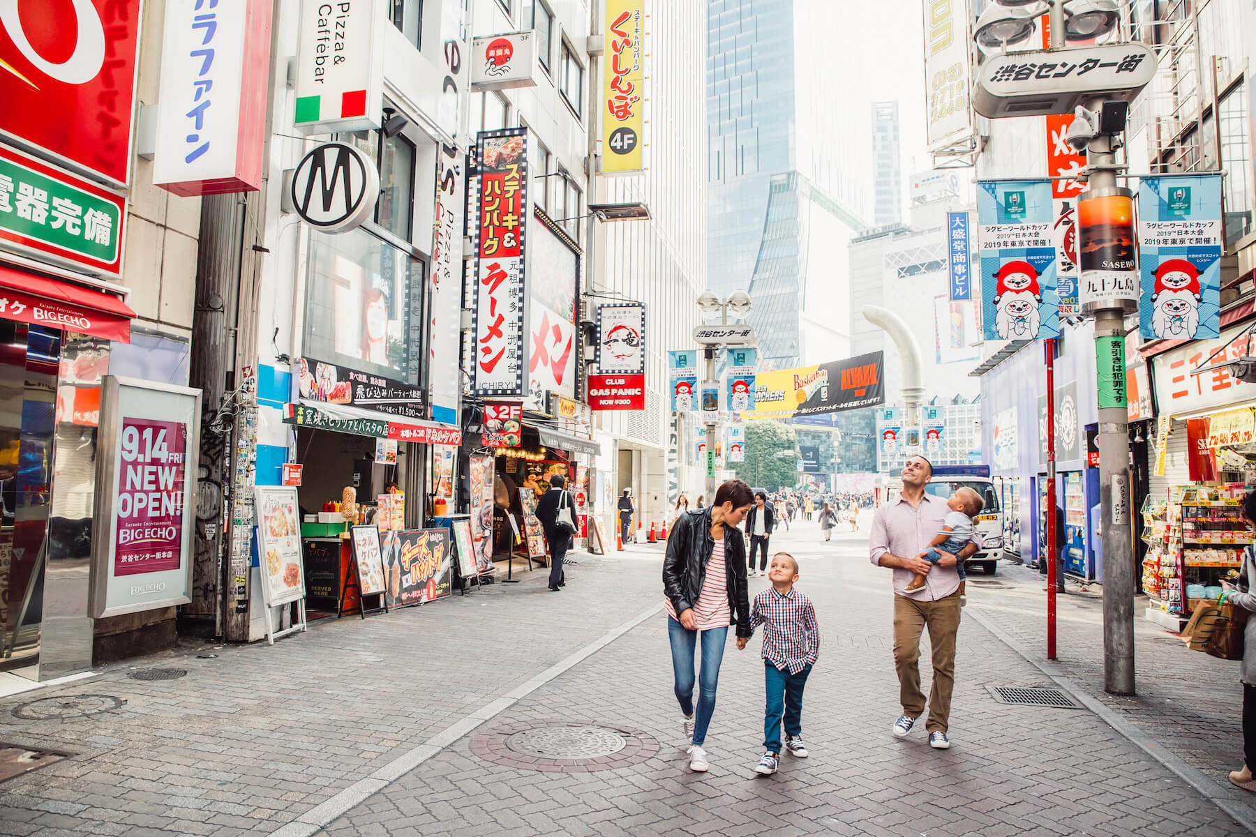 family of four walking in Tokyo, Japan