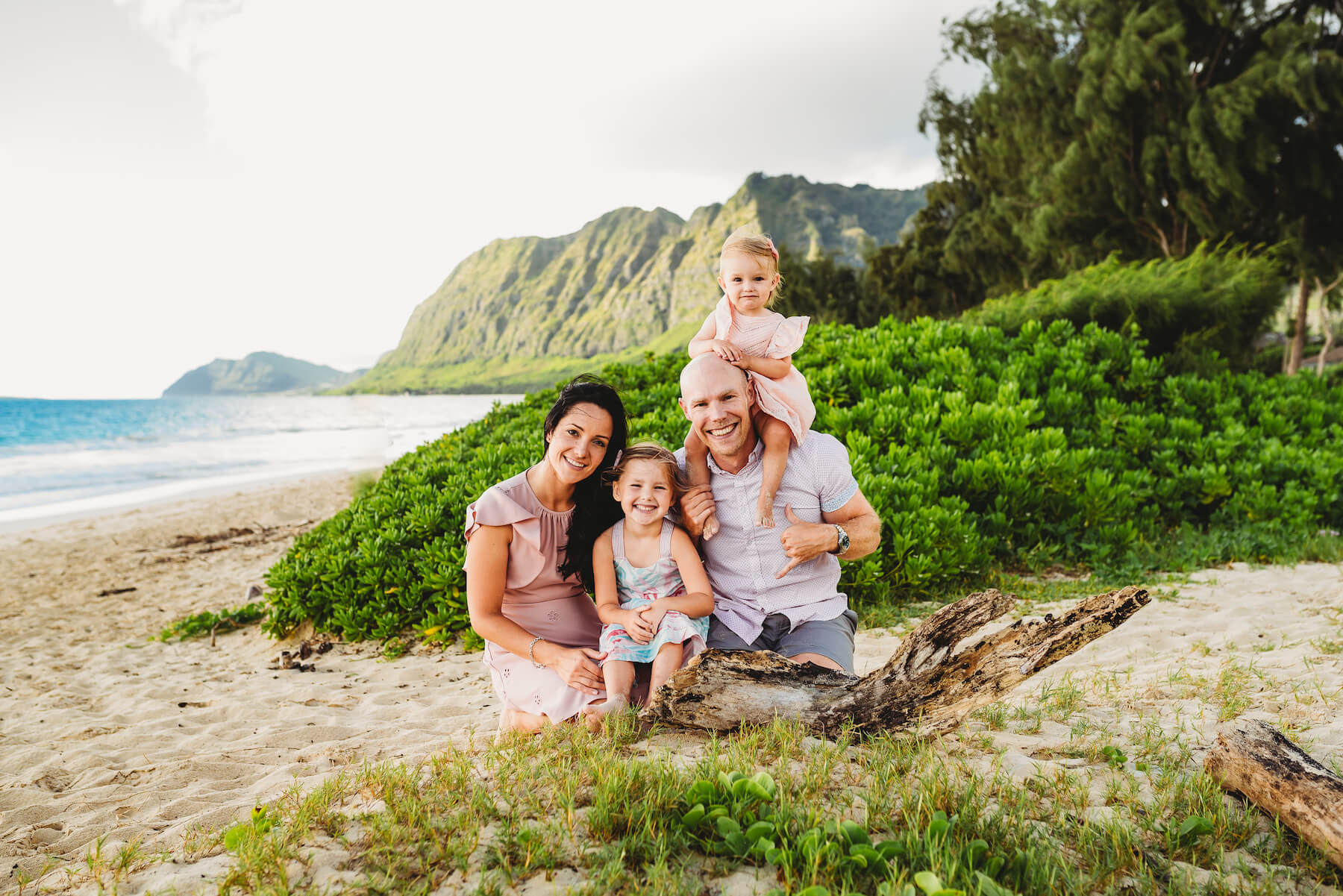 A family having fun on the beach in Honolulu, Hawaii