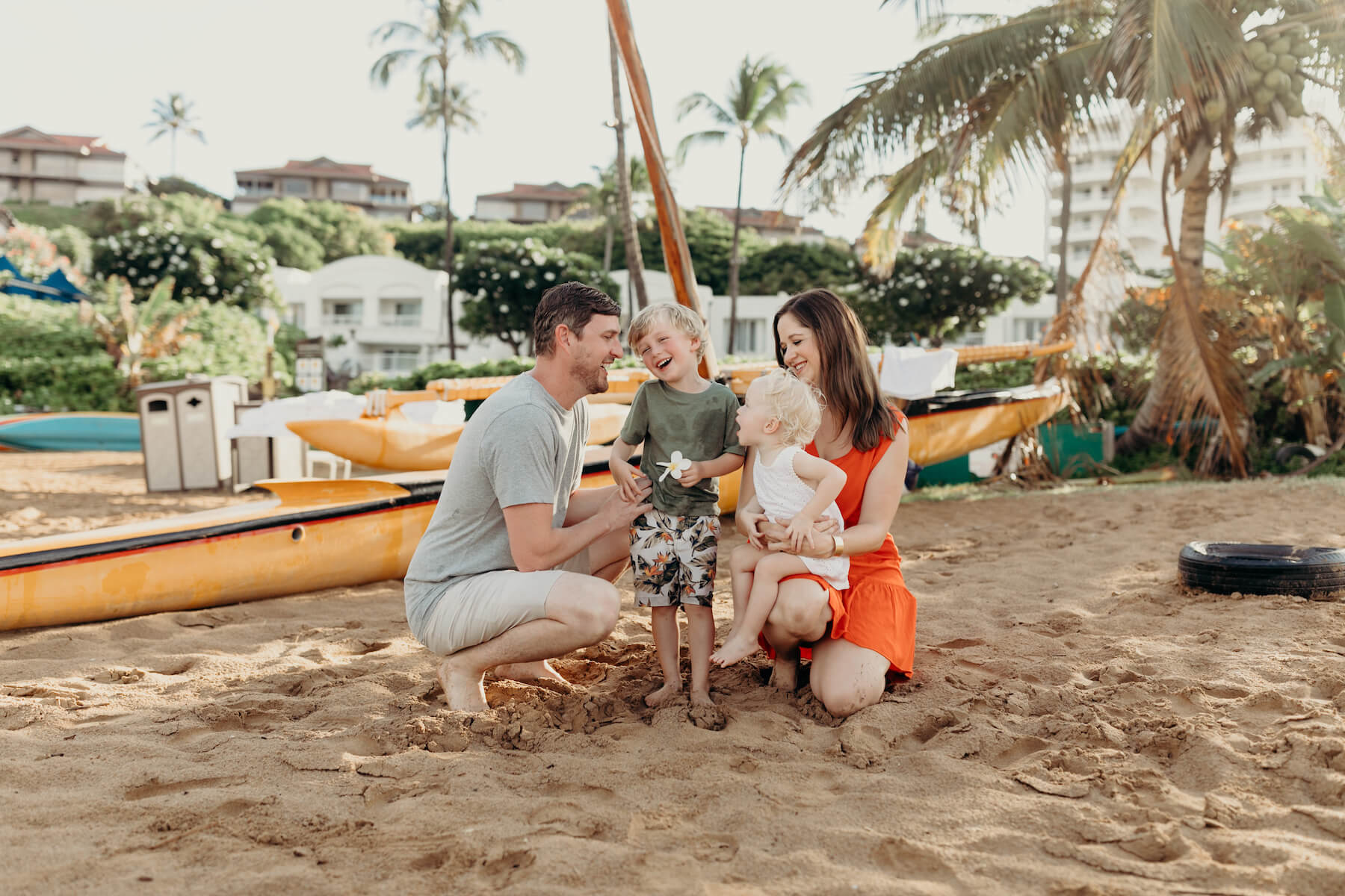 a family of four on the beach in Maui, Hawaii