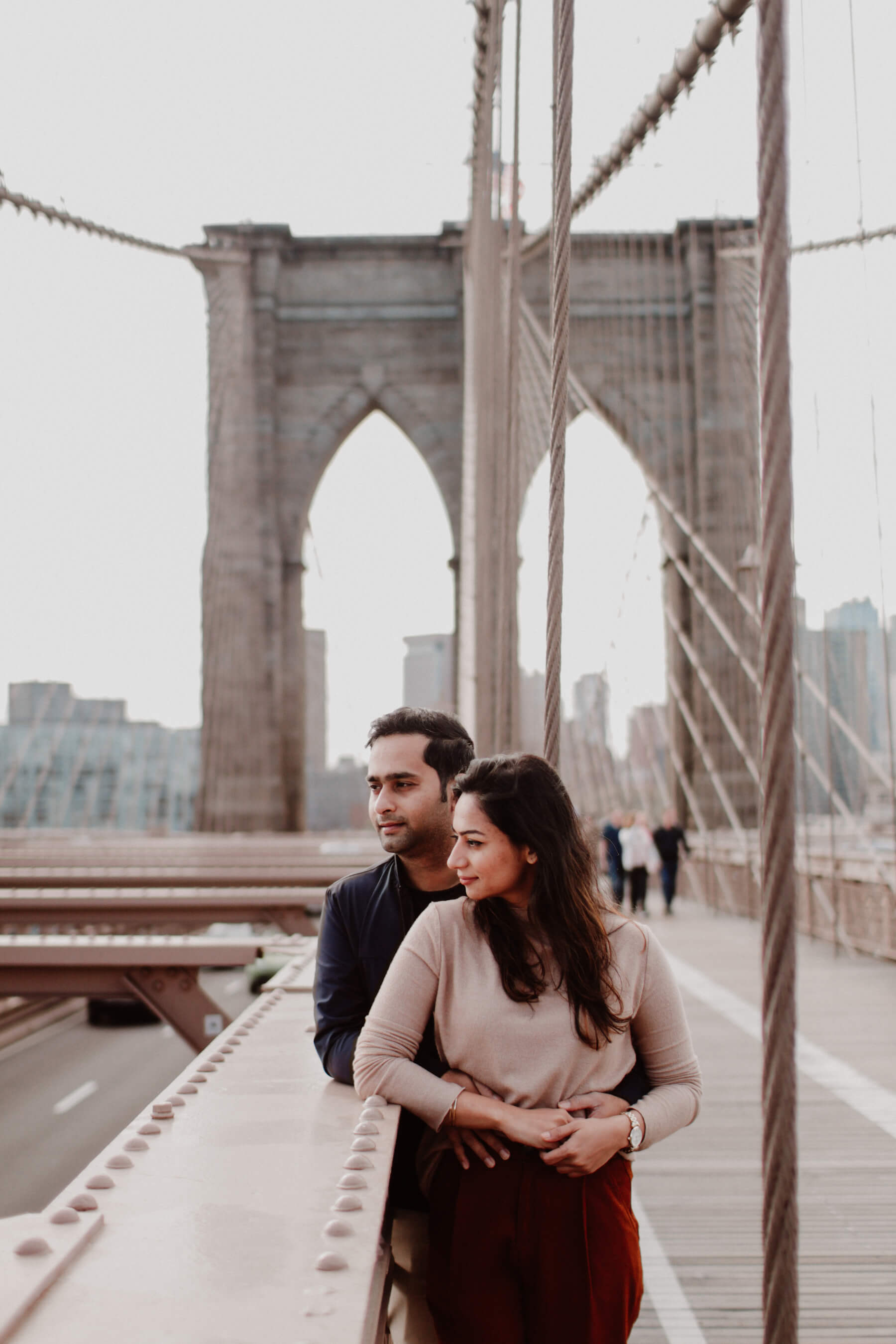 couple on the Brooklyn Bridge in New York City, New York