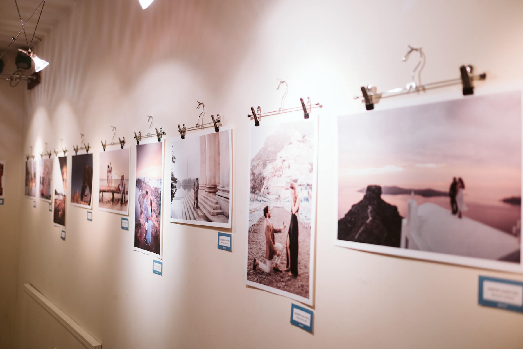 Photos on the wall in an art gallery in Santorini, Greece