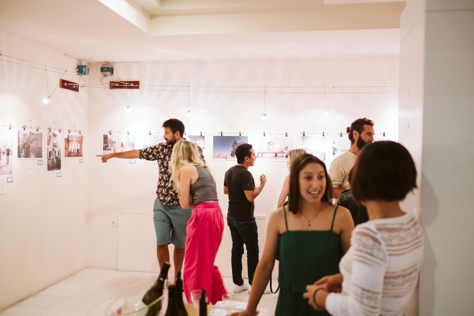 People in an art gallery in Santorini, Greece