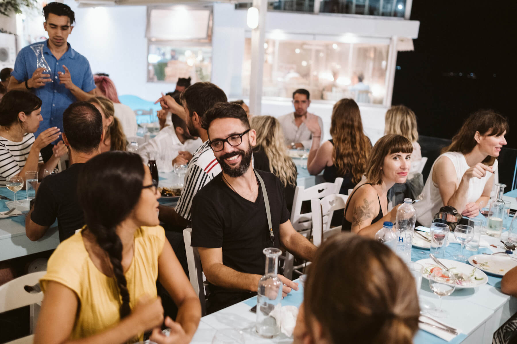 People having dinner in Santorini, Greece