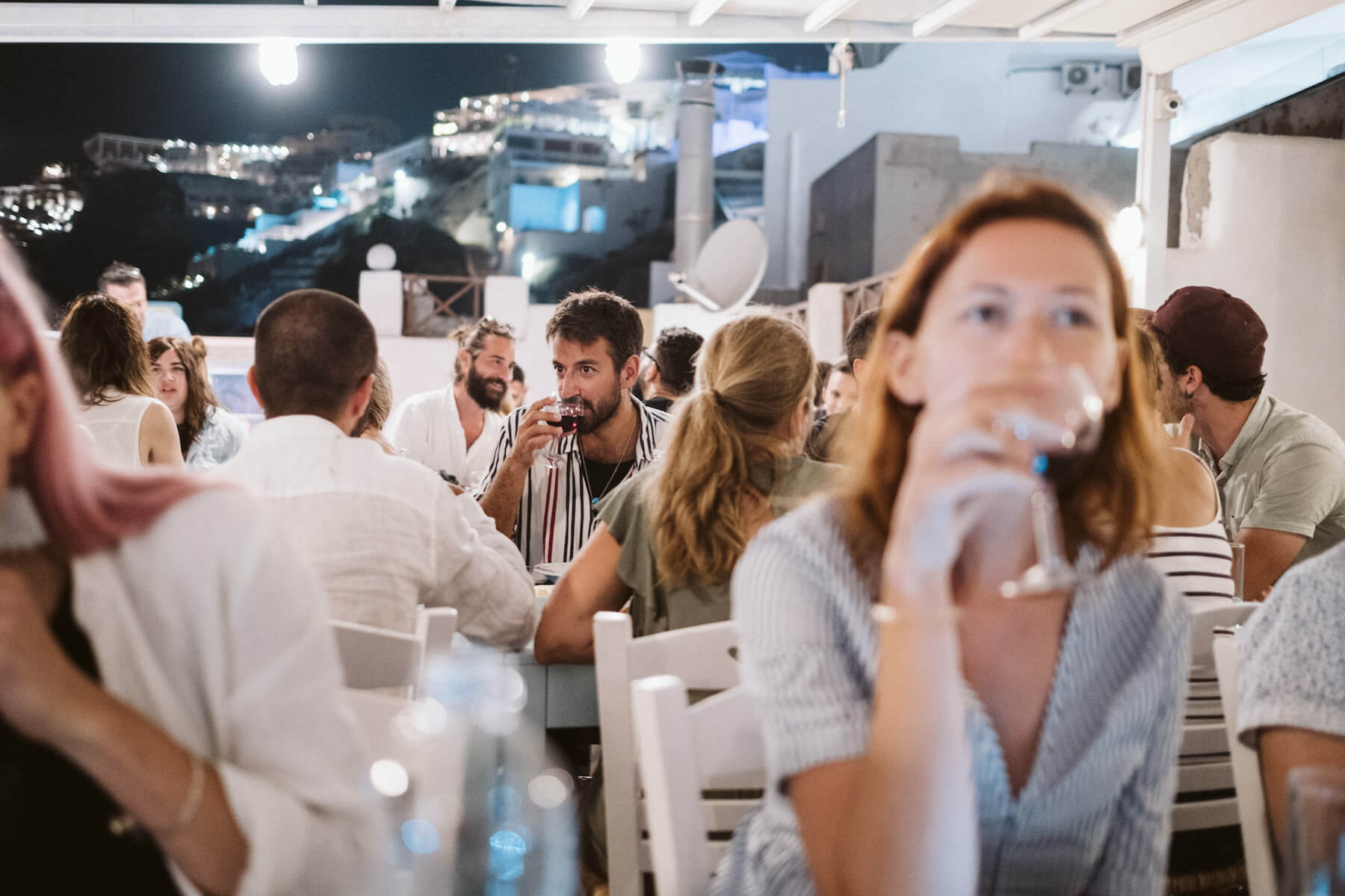 People having dinner in Santorini, Greece