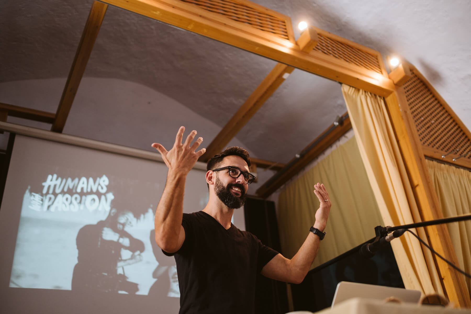 Man giving speech in a conference room in Santorini, Greece