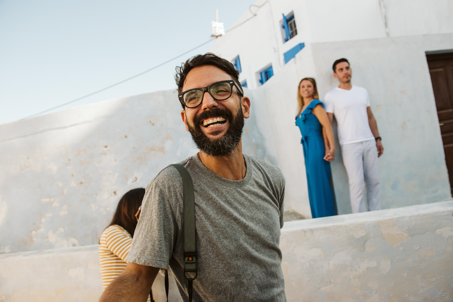 A man smiling in Santorini, Greece