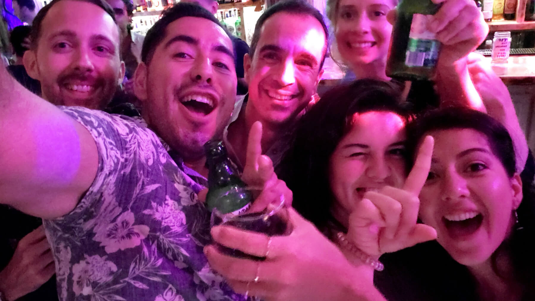 People dancing in a bar in Santorini, Greece
