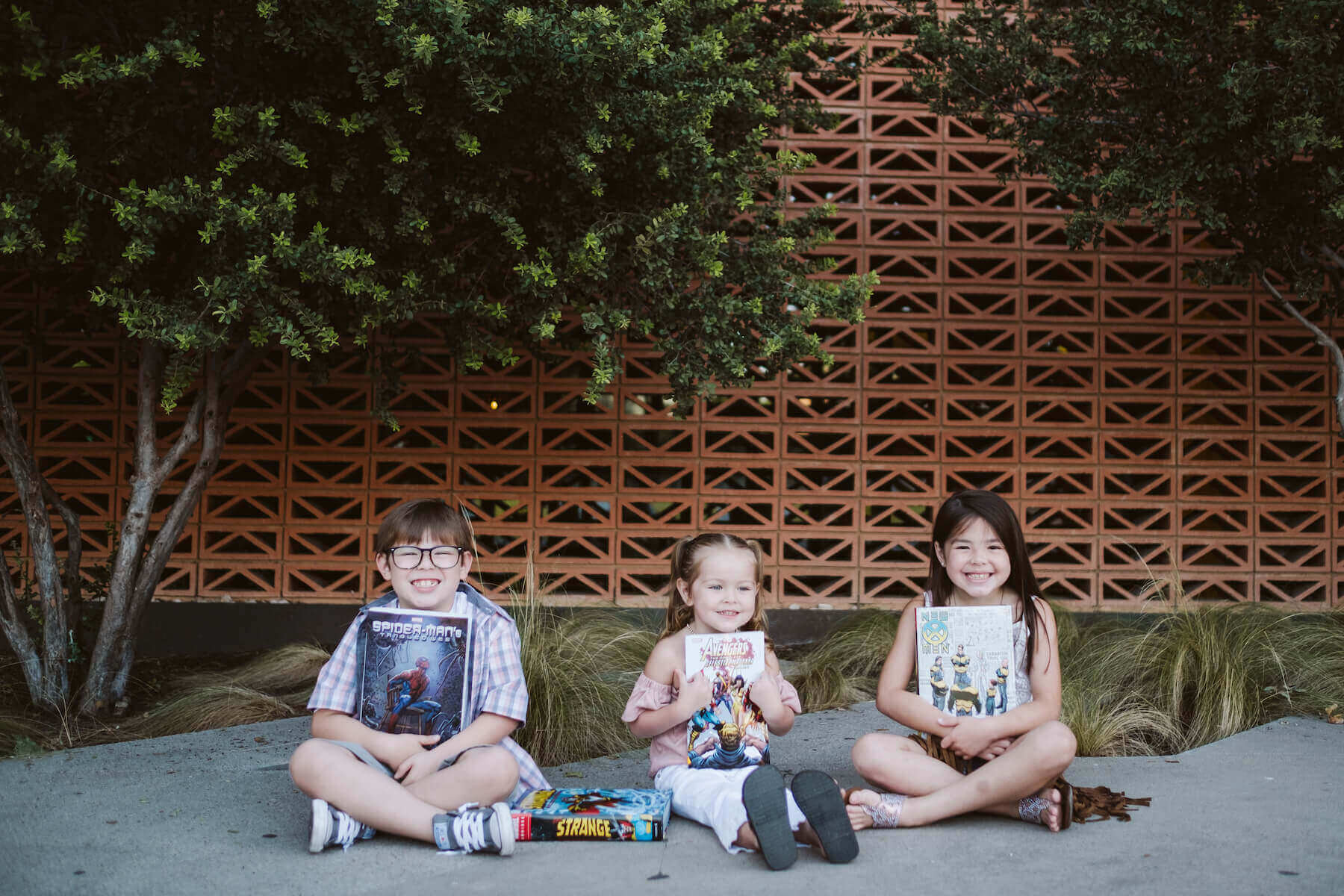 a family with two kids walking and having fun in Houston, Texas, USA