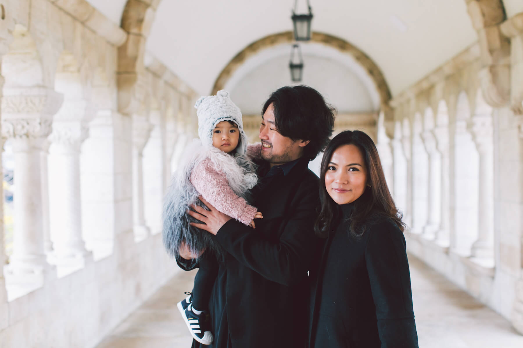 family standing in a city square in Budapest, Hungary