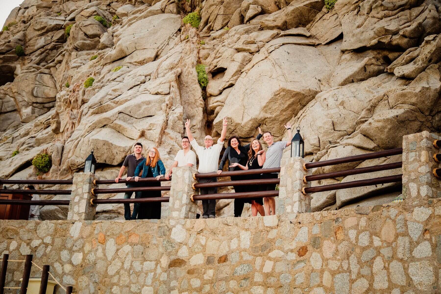 family standing on a look out and looking out at the ocean in Cabo San Lucas, Mexico