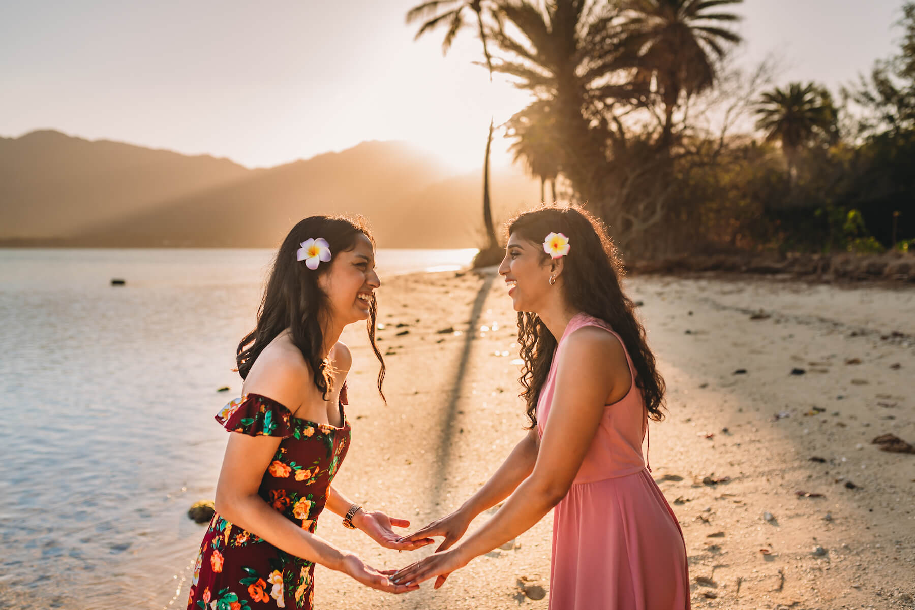 Sisters on the beach in Honolulu Hawaii USA