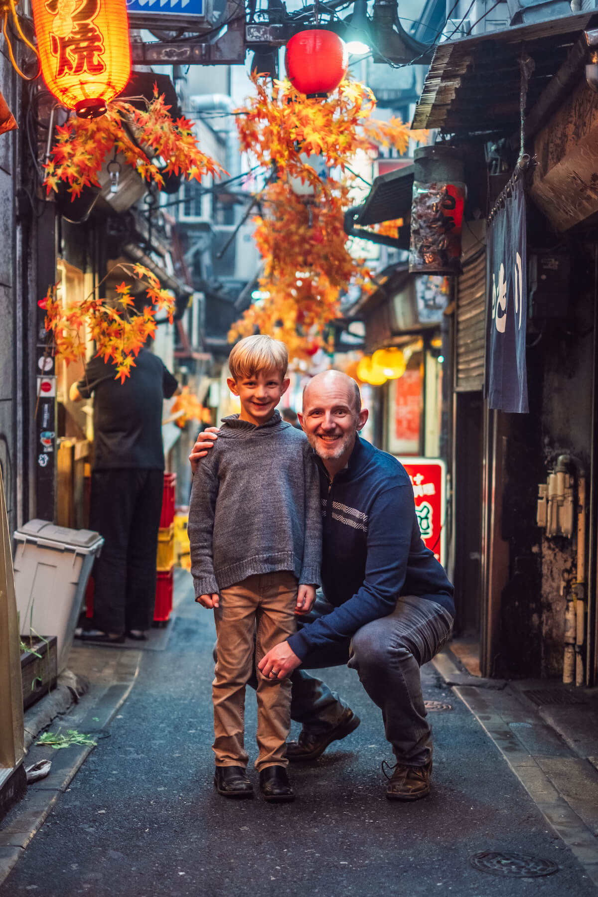 Son and Dad in an ally in Tokyo Japan