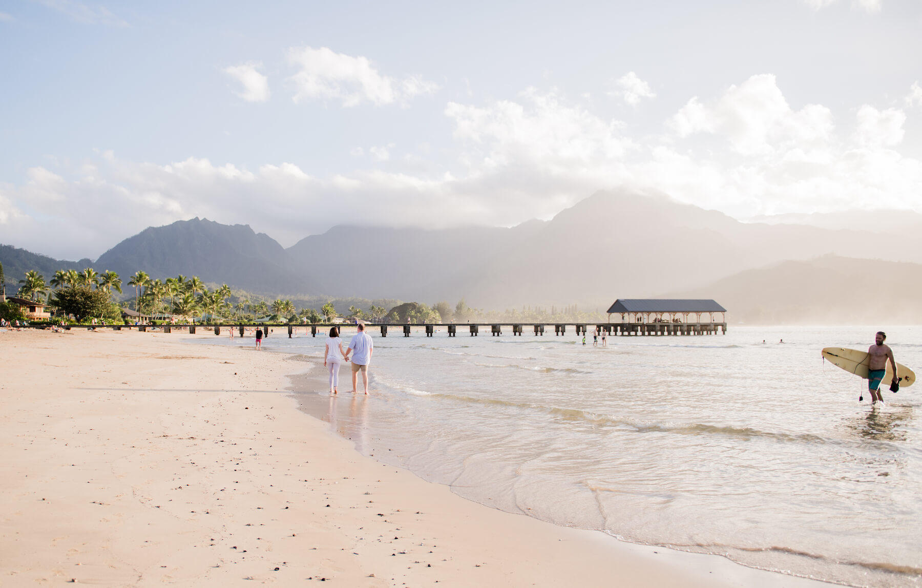 couple on a dock in Kauai Hawaii