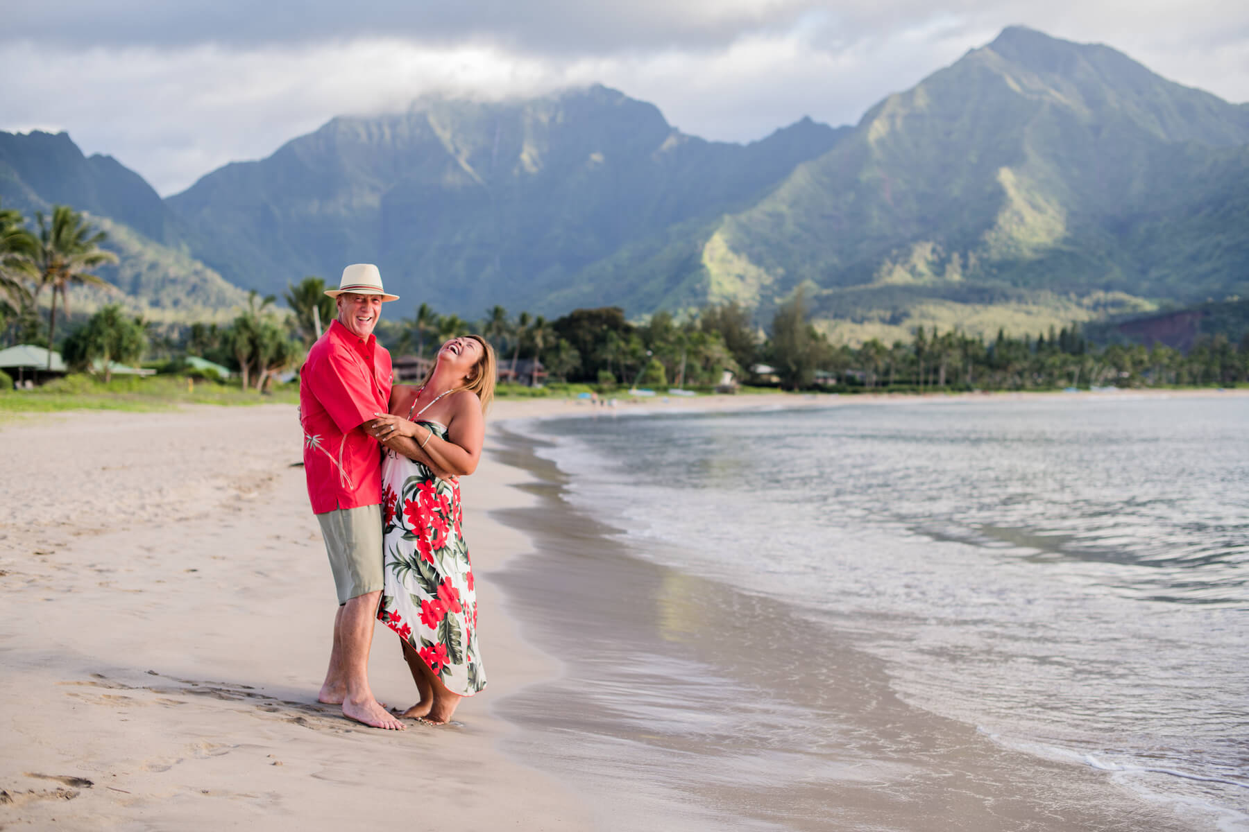 couple on a beach in Kauai Hawaii
