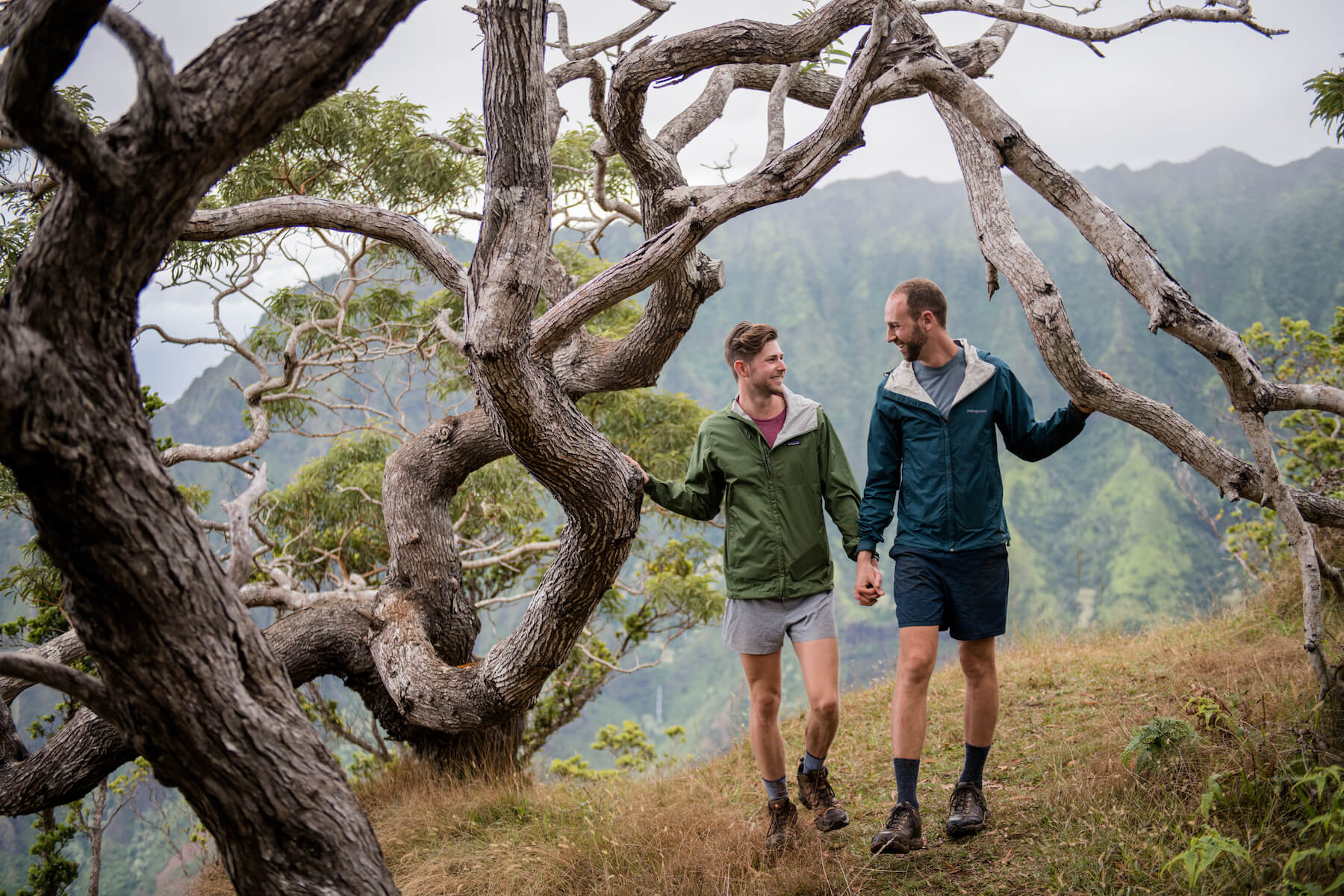 Guys on a hike in Kauai Hawaii monutian