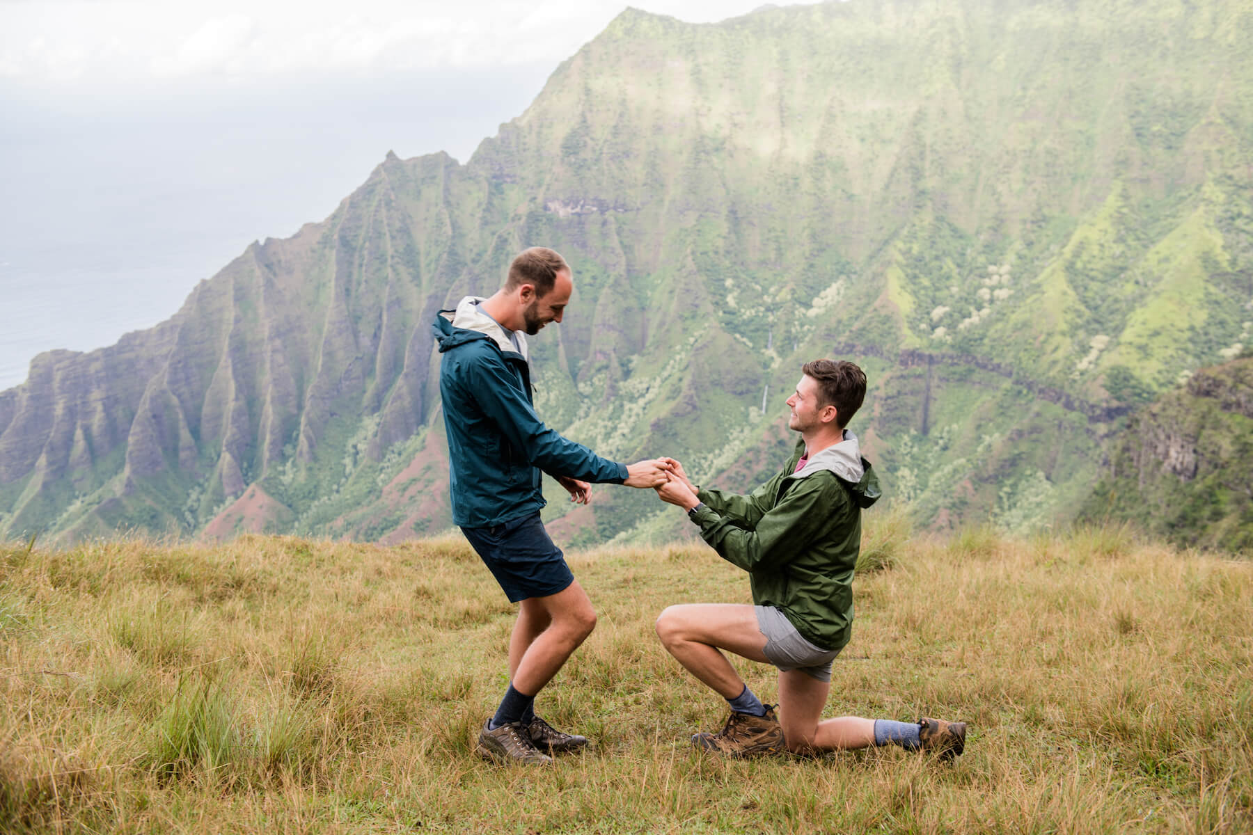 Guys on a hike in Kauai Hawaii monutian