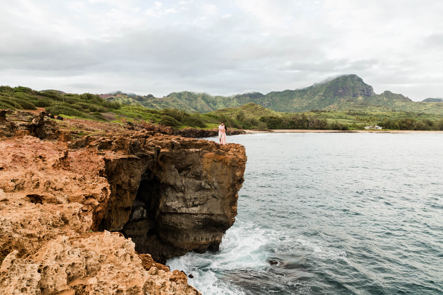 Couple laughing and walking in Kauai Hawaii