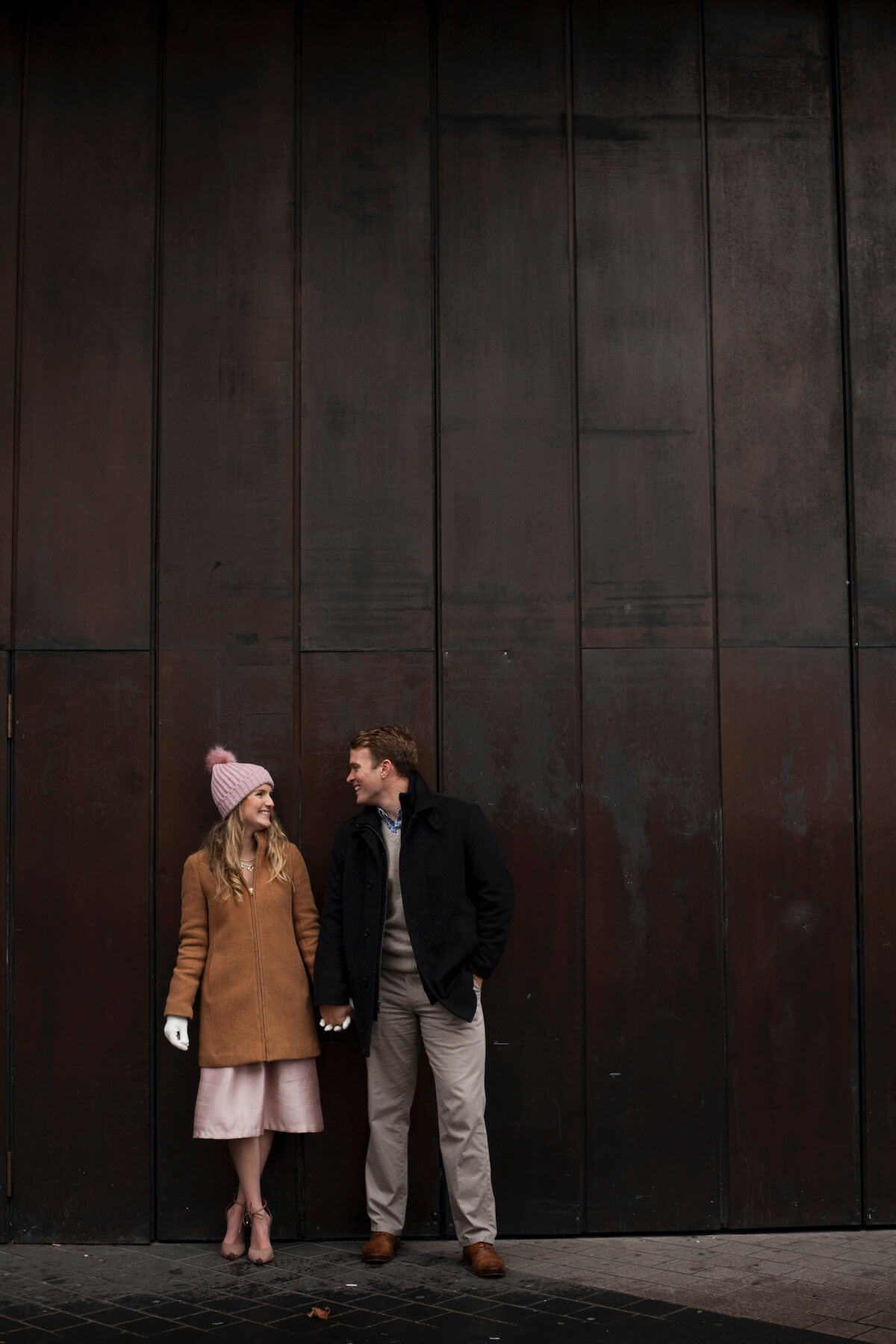 Couple in telephone booth London England