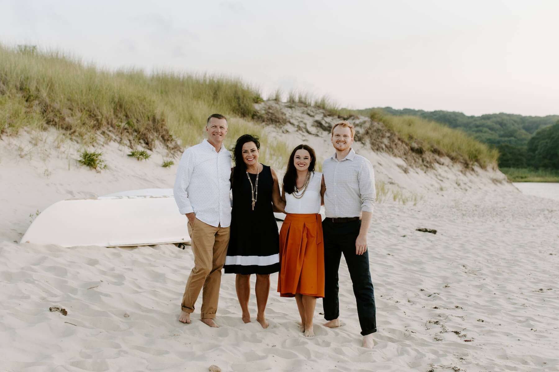 A couple walks along a dock in Martha's Vineyard, Massachusetts, USA.