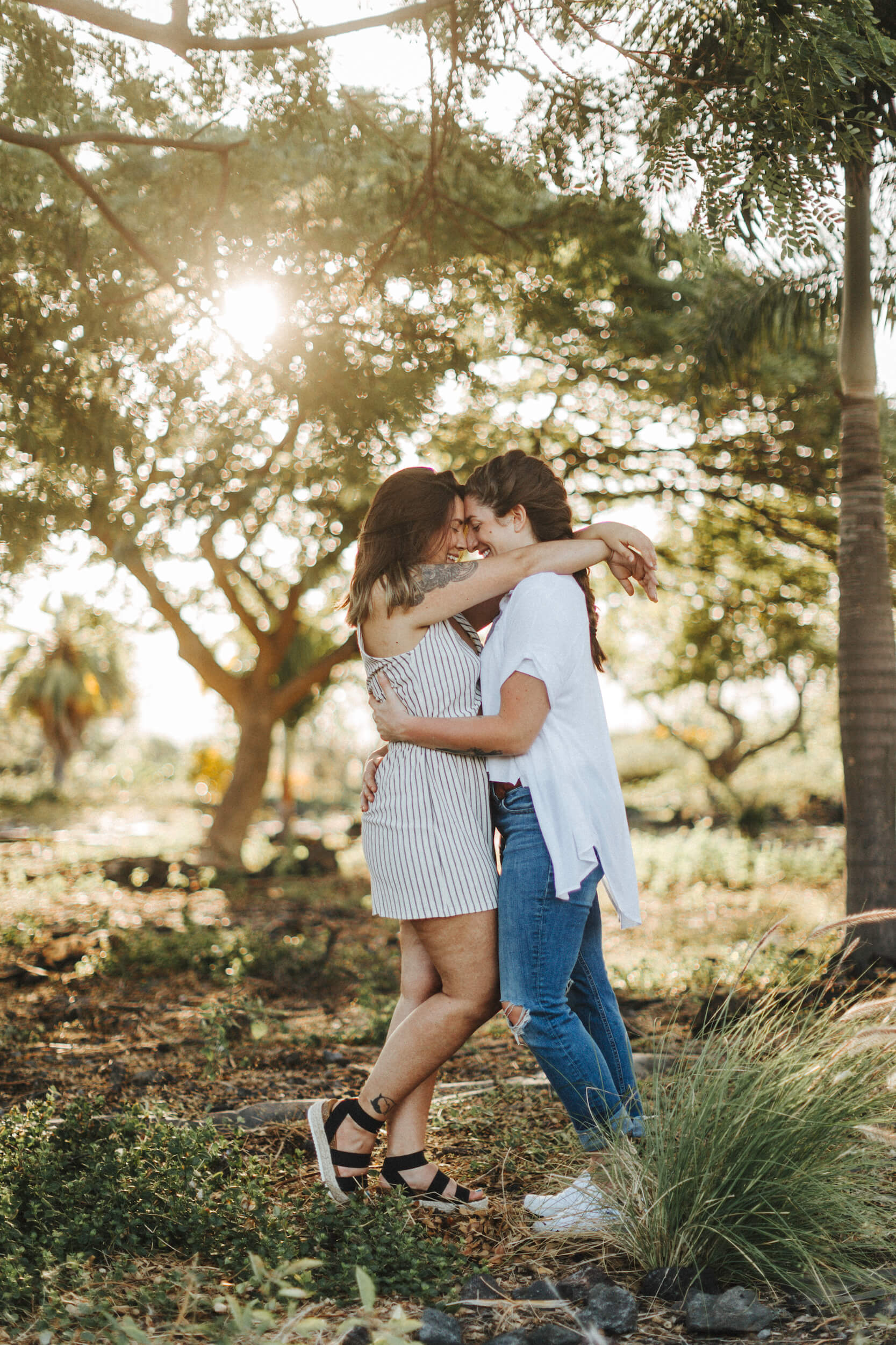 Kids running on the beach in Kona, Hawaii