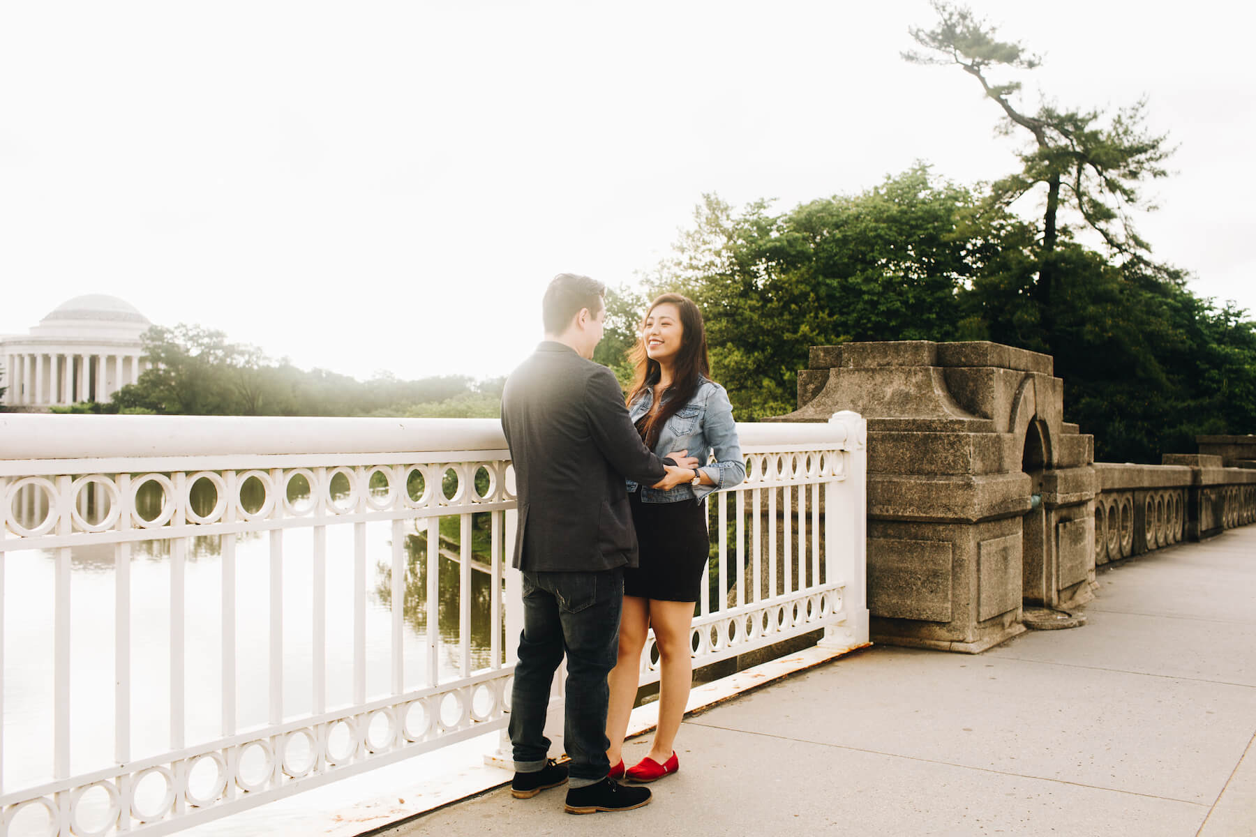 Couple walking inside the Lincoln Memorial in Washington DC on a couple photoshoot with Flytographer.
