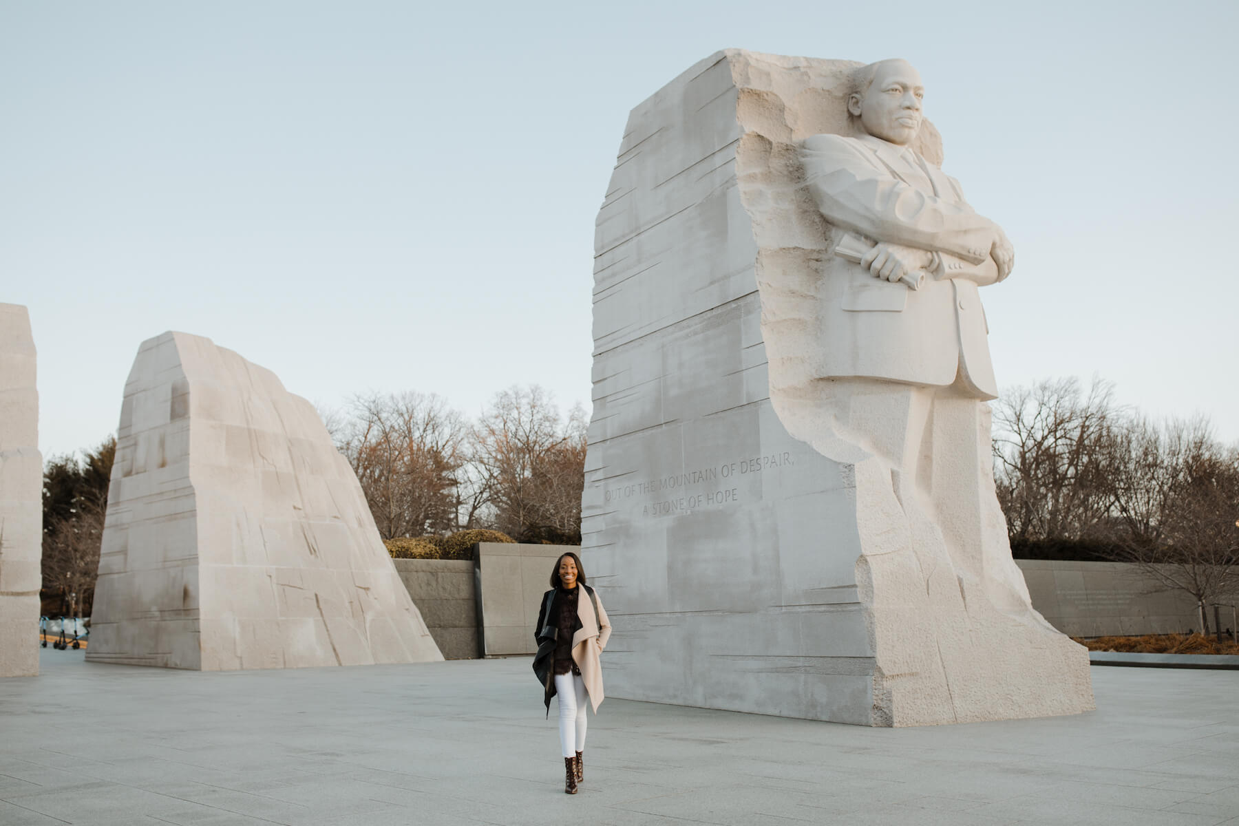 Woman walking at the Lincoln Memorial in Washington DC on a modern headshot photoshoot with Flytographer.