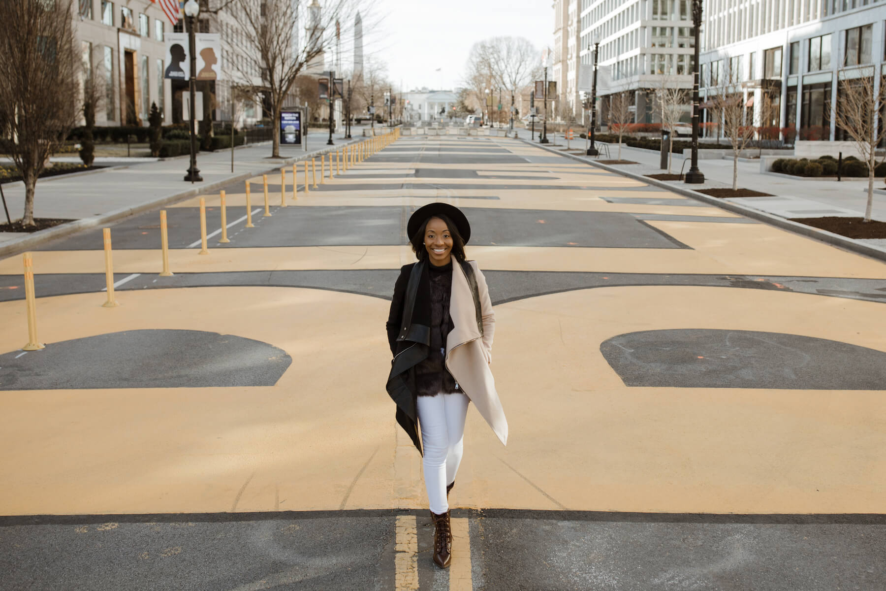 Woman walking at the Lincoln Memorial in Washington DC on a modern headshot photoshoot with Flytographer.