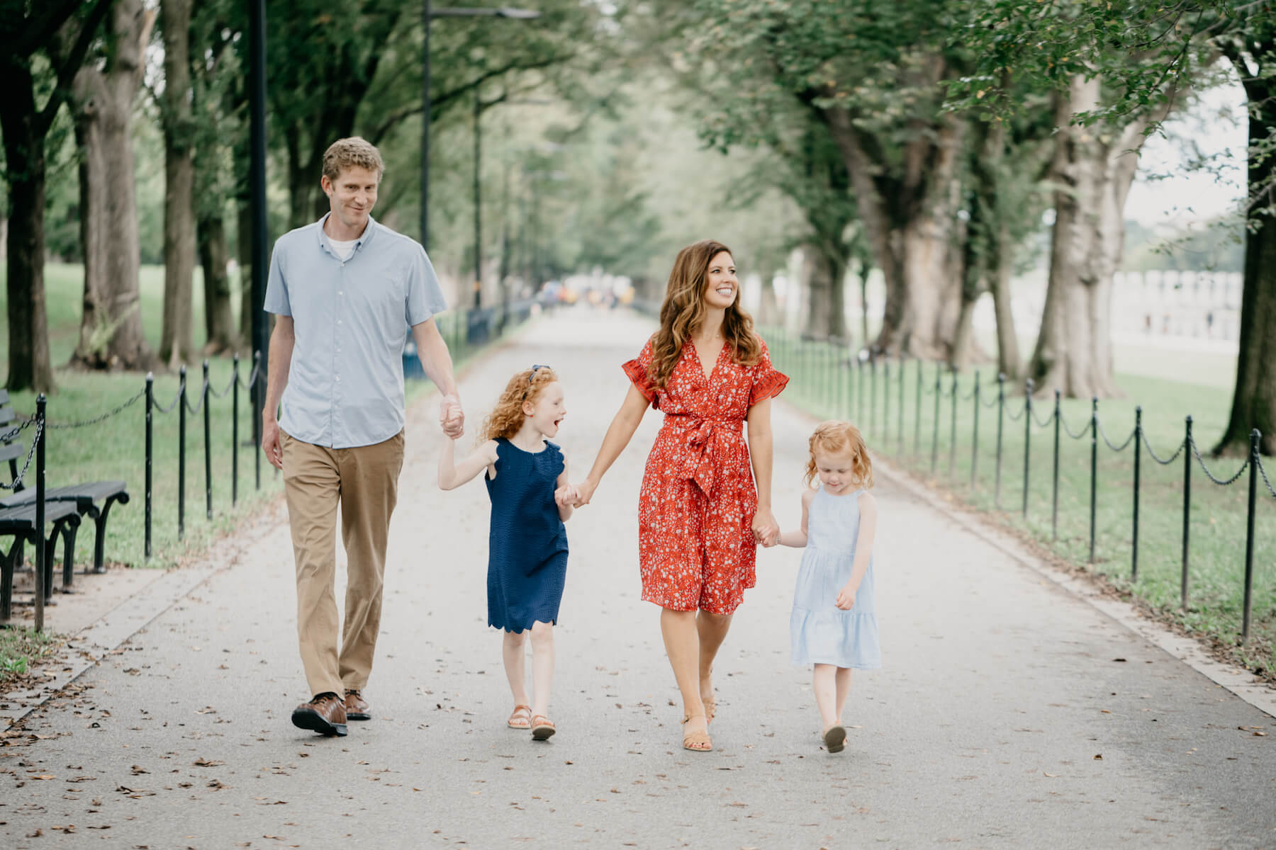 Family walking at the Lincoln Memorial in Washington DC on a family photoshoot with Flytographer.