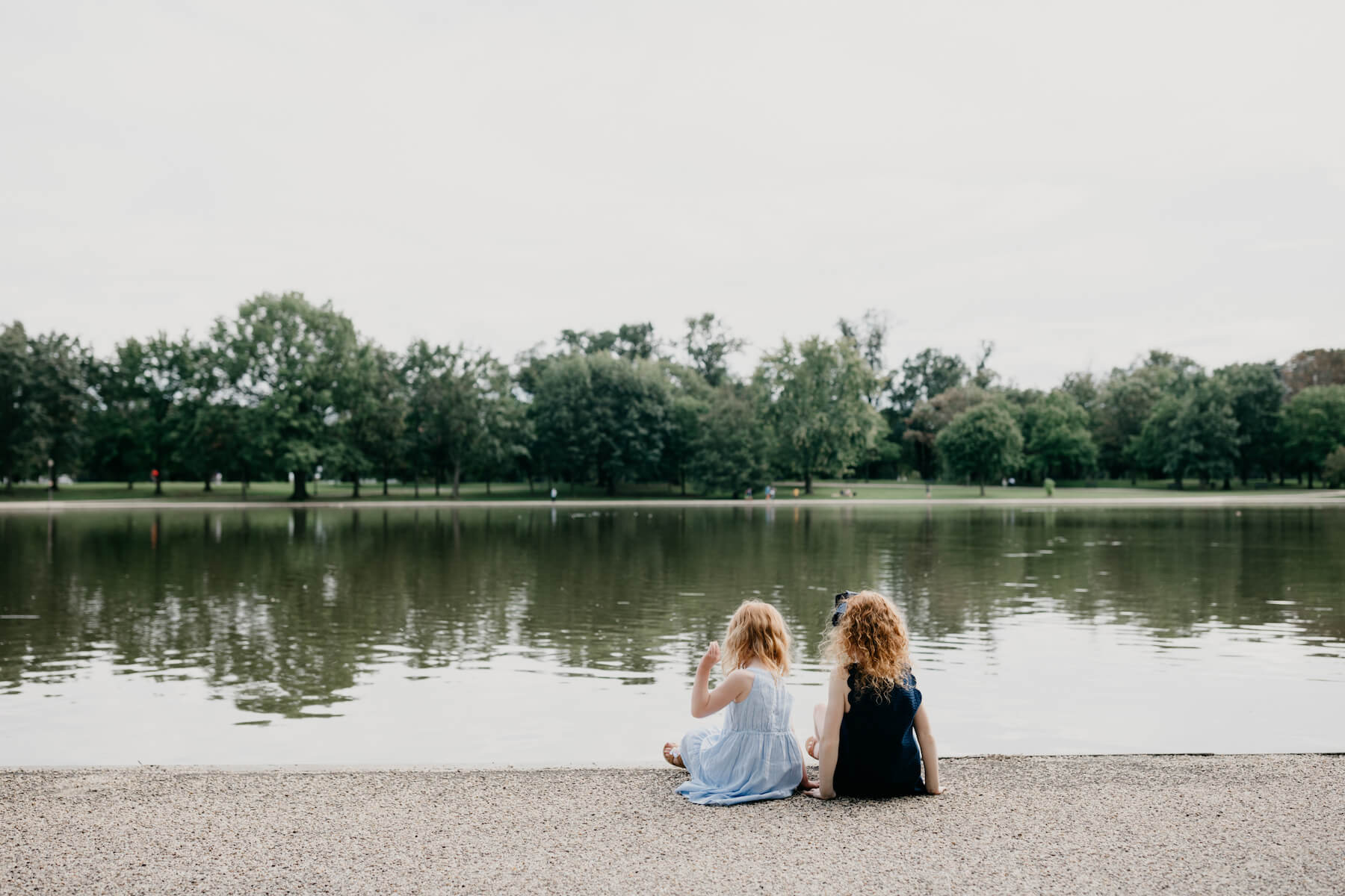 Family walking at the Lincoln Memorial in Washington DC on a family photoshoot with Flytographer.