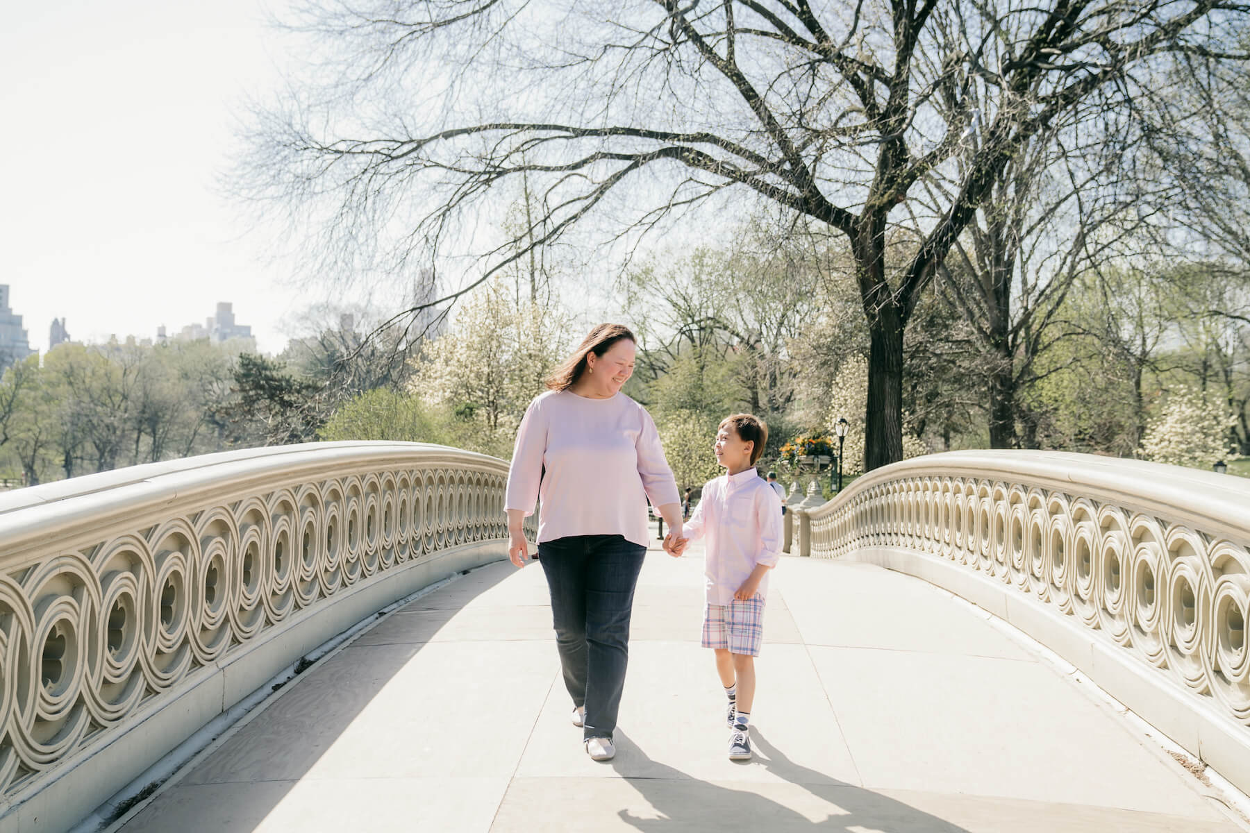 A mother and son in NYC capturing New York City family photos with Flytographer.