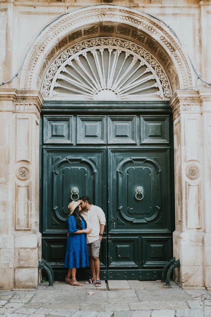 A couple walking in Puglia, which is one of the best places to visit in Italy, on a couples photoshoot with Flytographer.