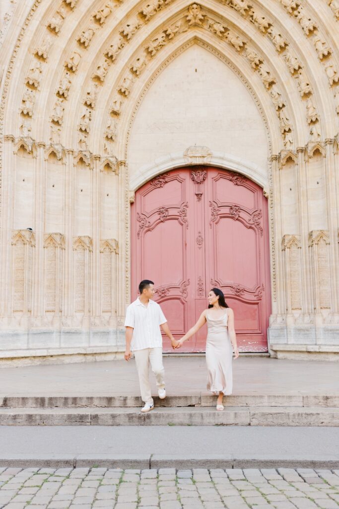 A couple walking in the streets of Lyon, France on a couples photoshoot with Flytographer.