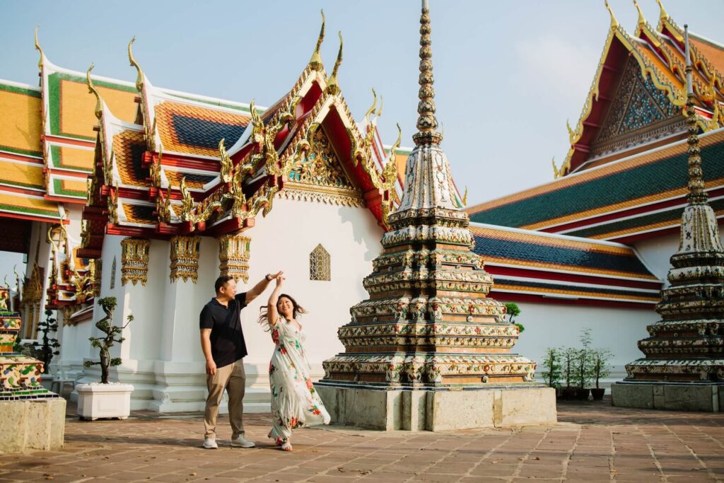 Couple dancing in Bangkok on a couples photoshoot with Flytographer