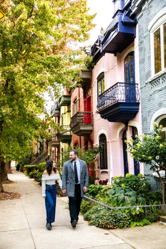 A couple walking together on the streets in Montreal, QC captured by Flytographer