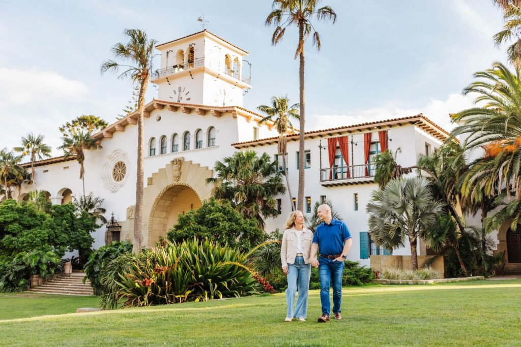 A couple walking in Santa Barbara, California, one of the most European cities in North America on a photoshoot with Flytographer