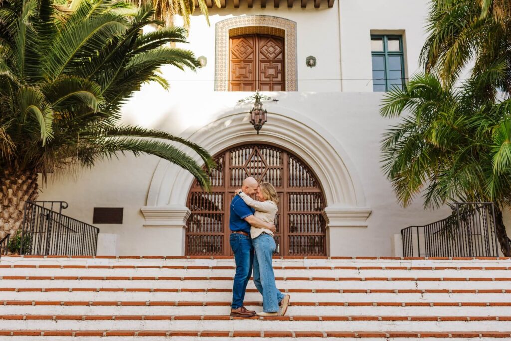 A couple walking in Santa Barbara, California, one of the most European cities in North America on a photoshoot with Flytographer