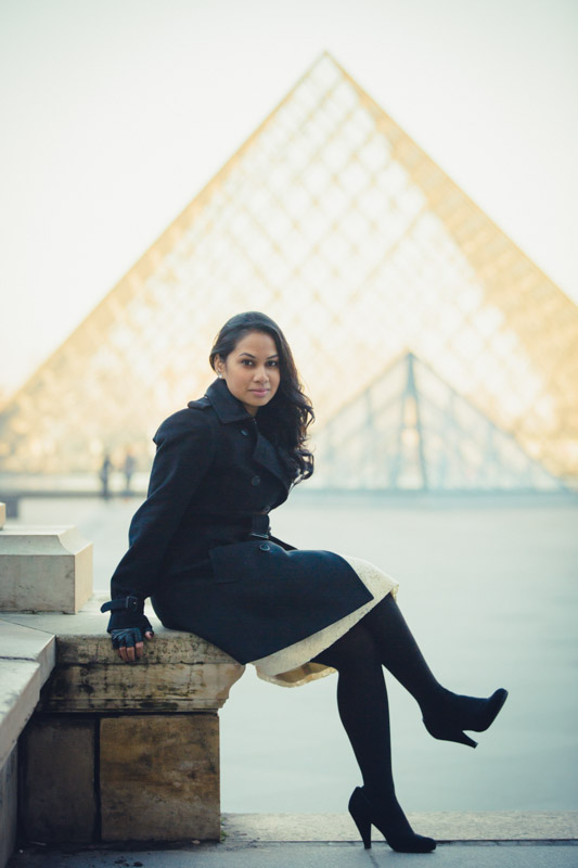 Capturing the magnificent Louvre in the backdrop.