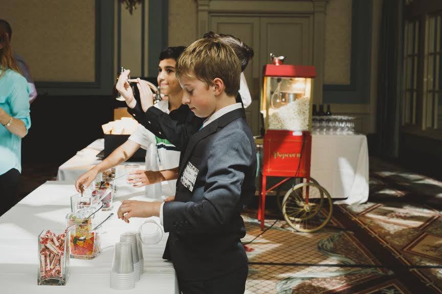 We served prosecco, popcorn, and had some Flytographer kids run the